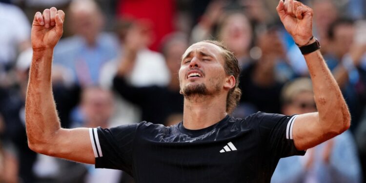 Germany's Alexander Zverev celebrates after winning the men's final singles match against Italy's Flavio Cobolli on day 15 of the French Open tennis tournament on Court Philippe-Chatrier at the Roland-Garros Complex in Paris on June 7, 2026. (Photo by Dimitar DILKOFF / AFP)